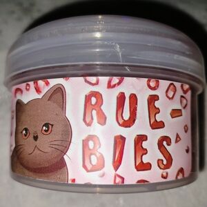 Cute Cat-Themed Container with Red Accents